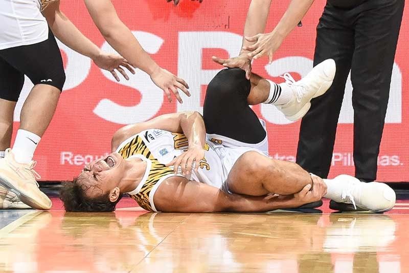Injured CabaÃ±ero hopes to play for UST against La Salle