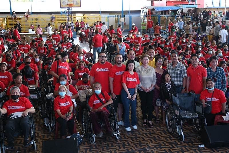 Alagang Akay rolls out 200 wheelchairs for PWDs in Laguna