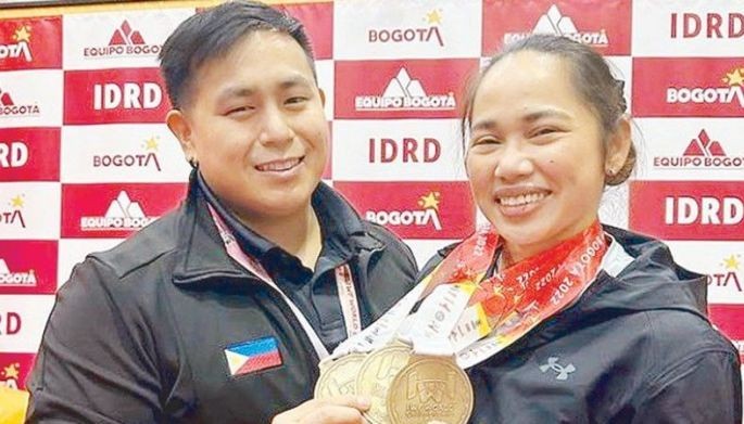 Marcos takes hat off to Hidilyn