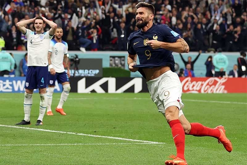 France battle past England as Morocco make World Cup history