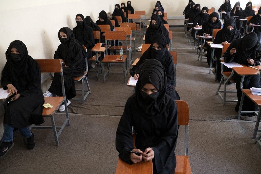 Taliban order NGOs to stop women staff from working over 'hijab'