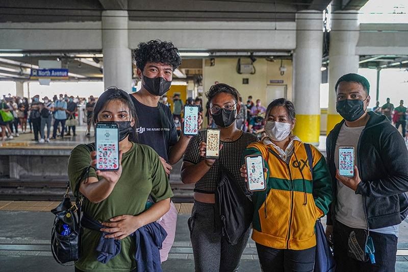 Filipinos are swarming at MRT-3 stations to play a game and win a car!