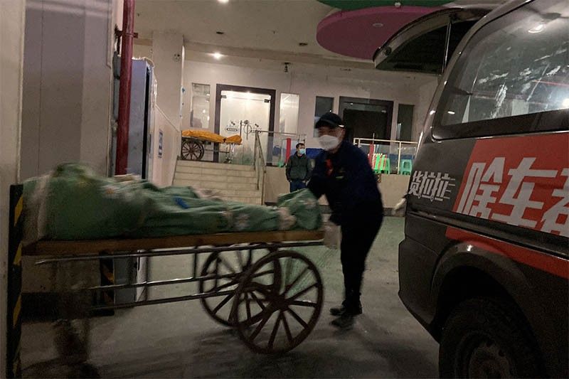 China authorities take over medical supplies production as Covid surges