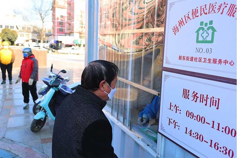 Elderly Covid patients fill hospital wards in China's major cities