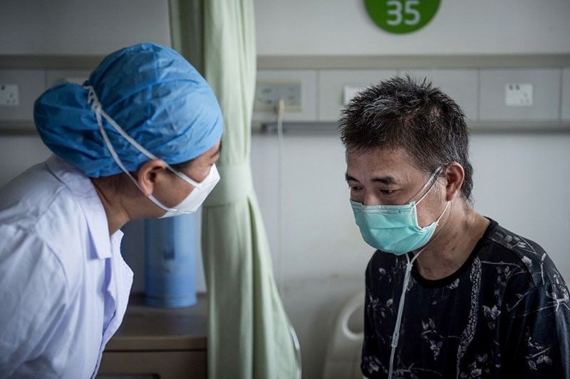 Caring with COVID-19: Infected doctors battle China virus surge