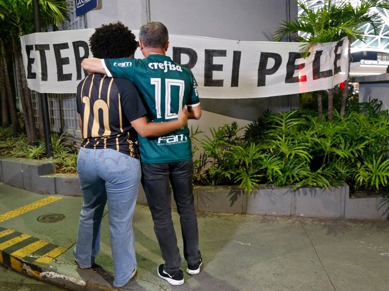 'Our greatest idol': Brazilians flock to hospital after Pele's death