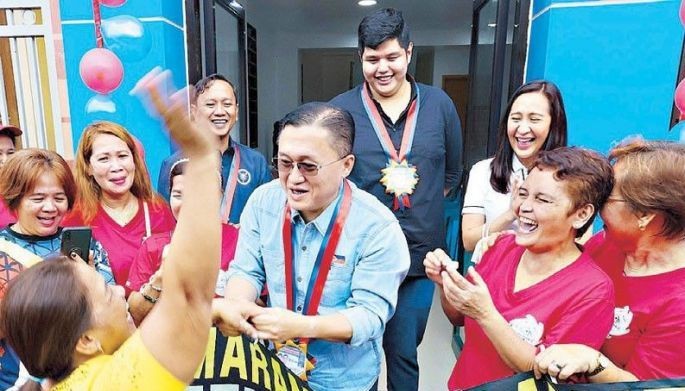 Senator Go, Quezon City councilor turn over multi-purpose buildings to residents