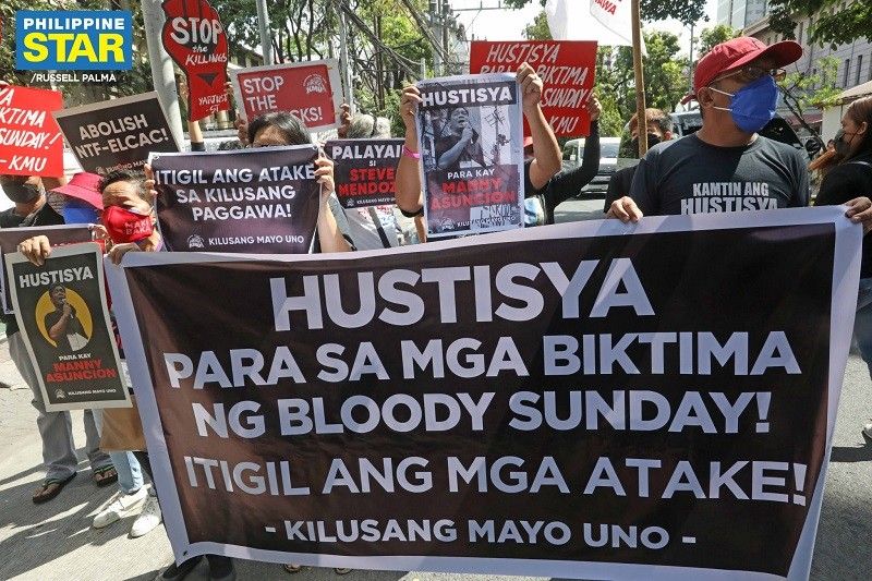 Pagbasura sa murder raps vs 17 pulis sa 'Bloody Sunday' killings ikinadismaya