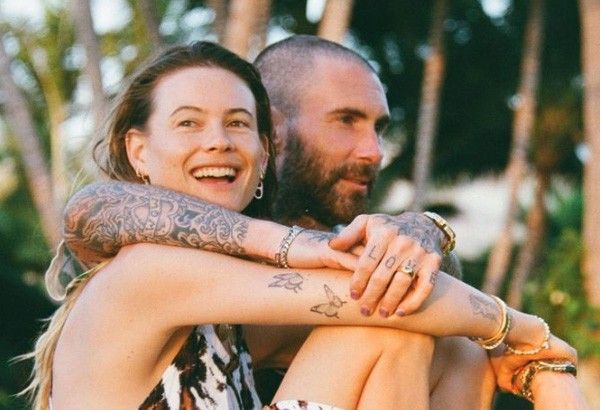 Behati Prinsloo shows glimpse of 3rd baby with Adam Levine