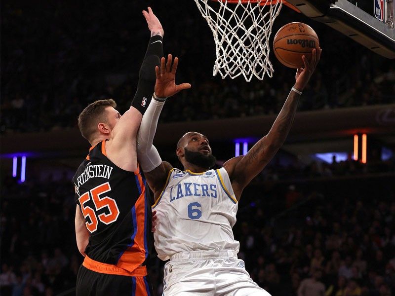 LeBron churns out triple-double as Lakers edge Knicks in OT