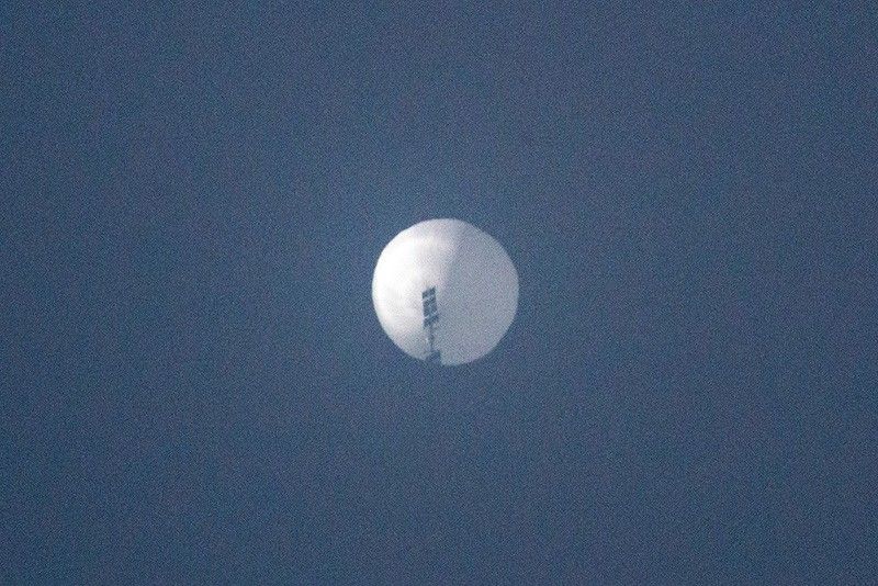 China says it is working to “verify” reports that it flew a spy balloon over the US