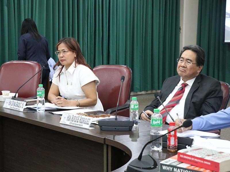 In this handout photo, Reps. Divina Grace Yu (Zamboanga del Sur) and Rufus Rodriguez (Cagayan de Oro) hold a commitee hearing on charter change at the House of Representatives on February 8, 2022.