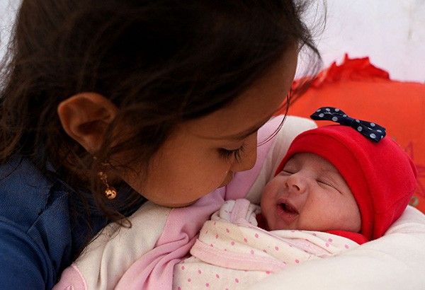 Syria family takes in baby born under quake rubble
