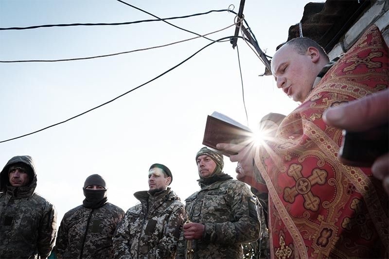 Ukrainians pray, ready for strikes one year after Russian invasion