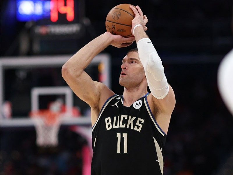 Bucks counter Magic sans Giannis; Sixers tame Wolves