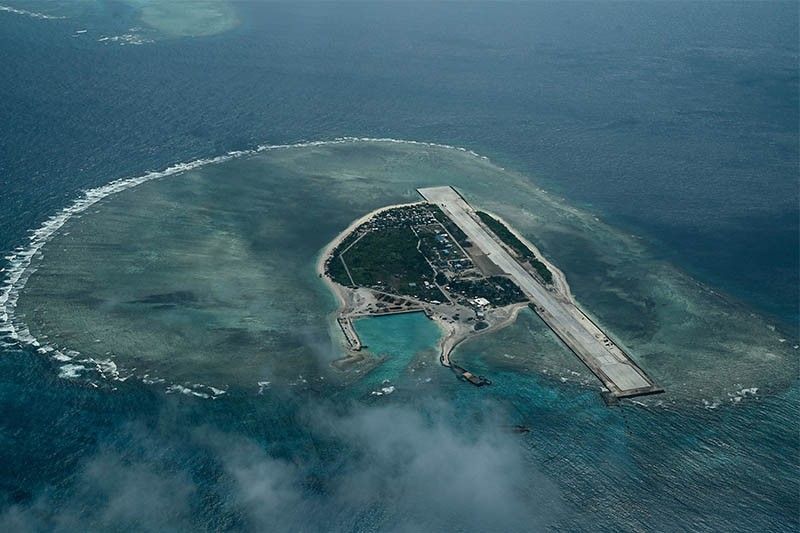 Chinese security vessel orders Philippine plane carrying media to 'leave'