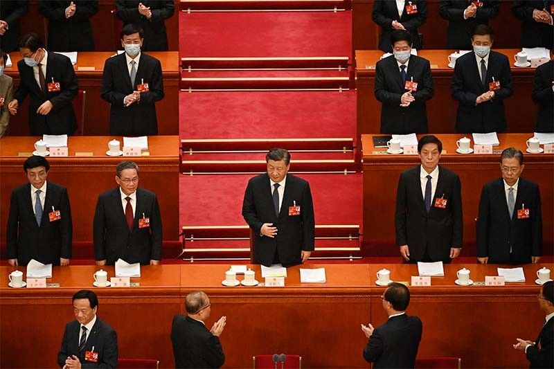 China's Xi handed historic third term as president