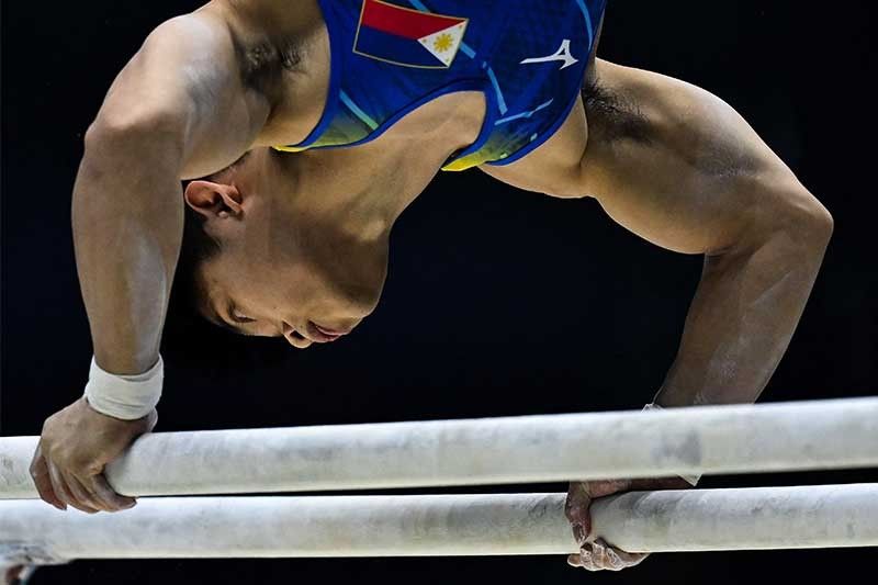 Carlos Yulo strikes gold in Baku with parallel bars masterclass