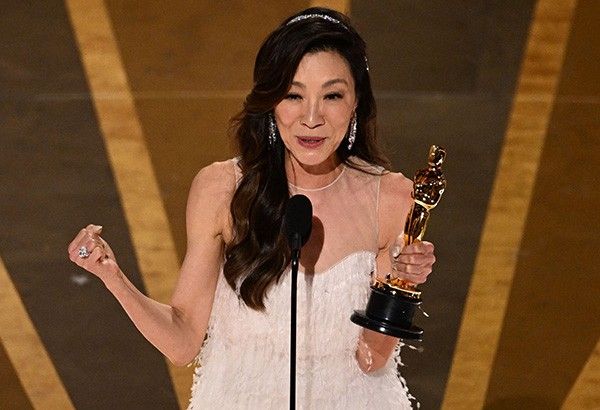 Michelle Yeoh makes history as first Asian to win best actress Oscar