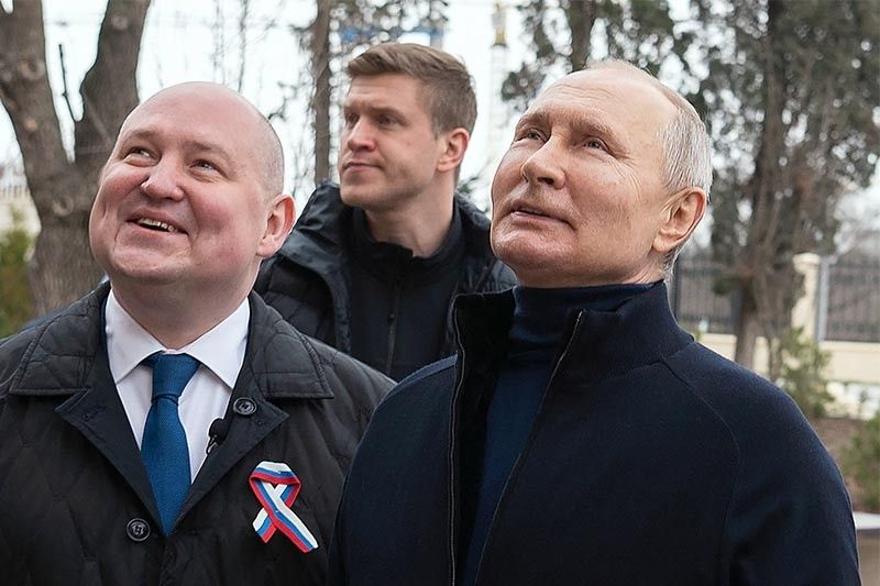 Putin visits Mariupol in first trip to fallen city