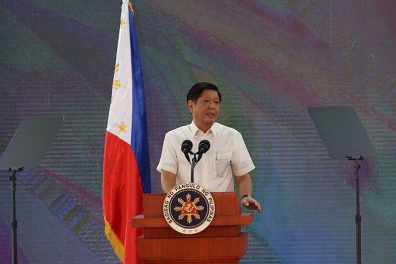 Marcos promises homes for soldiers, police