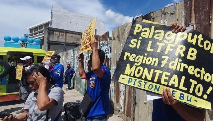 Members PISTON-Cebu stage a picket rally outside of the regional office of Land Transportation Franchising and Regulatory Board (LTFRB)-7 to call for the ouster of regional director Eduardo Montealto, Jr. 