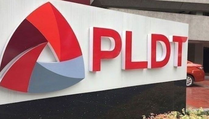PLDT told to trim debt to regain rating