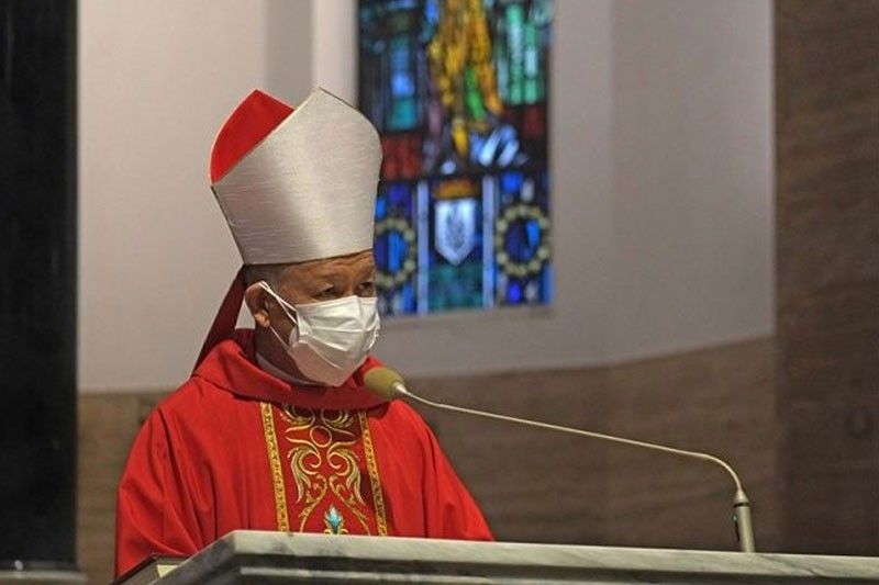 Manila Archbishop leads washing of feet of 12 â��apostlesâ��