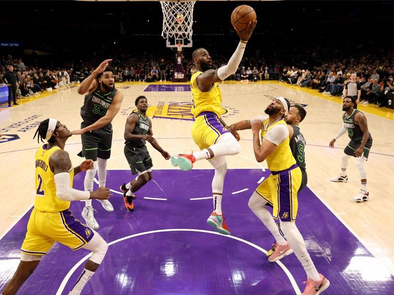 LeBron steers Lakers to NBA playoffs after OT win vs Wolves