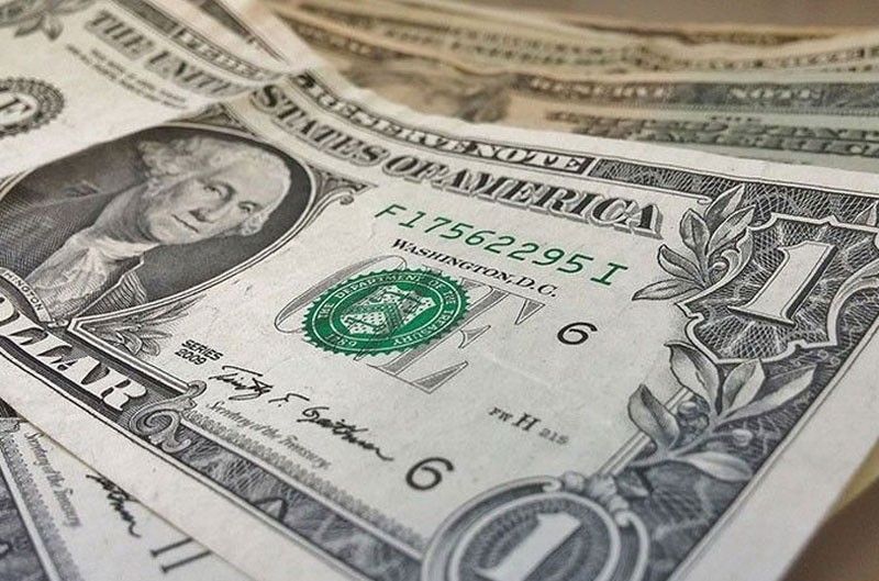 Peso weakens further, pierces 56 to $1 level