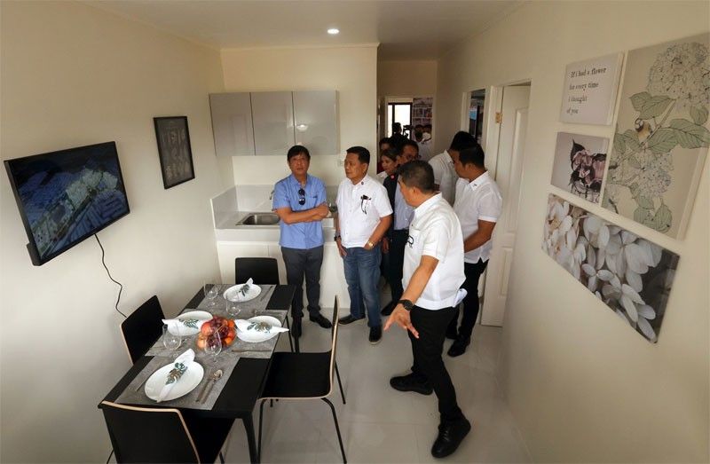 Agencies ink deal to provide socialized housing for OFWs
