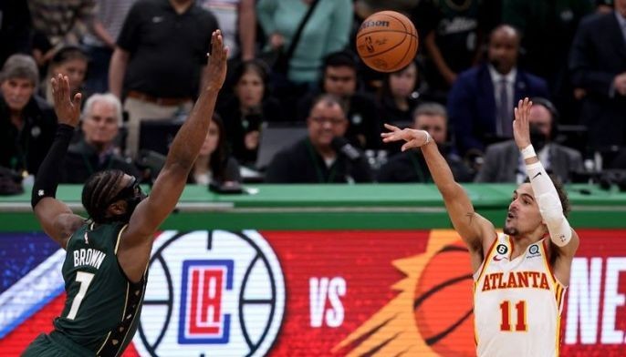 Atlanta Hawks guard Bogdan Bogdanovic (13) shoots the ball against the  Boston Celtics the fourth quarter of game one of the 2023 NBA playoffs at  TD Garden.