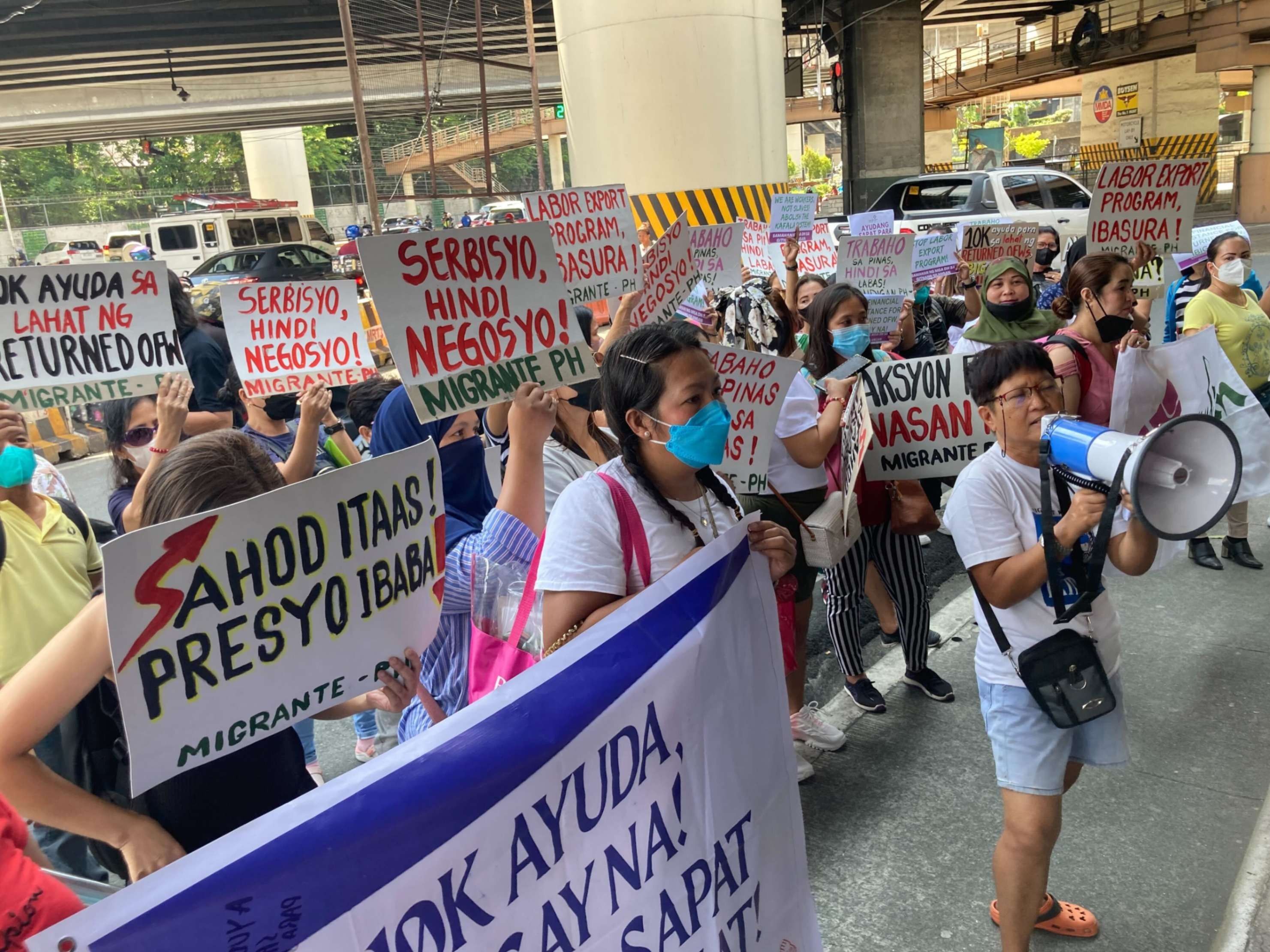 OFWs who came home due to pandemic call for release of DMW financial aid thumbnail