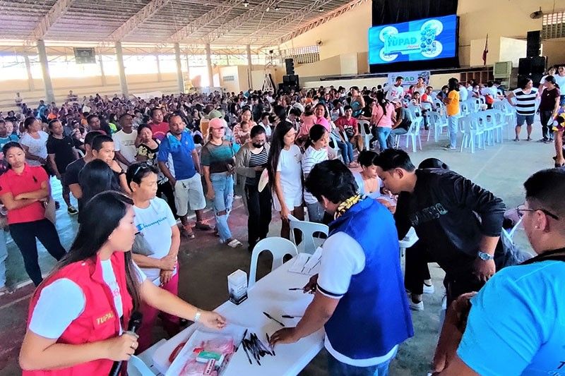 In Northern Cebu: Almost 2,000 TUPAD workers receive salary