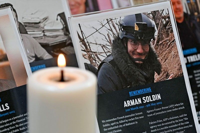 France opens war crime investigation into AFP reporter's death