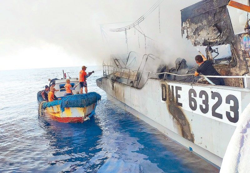 Fishing boat catches fire, sinks off Palawan