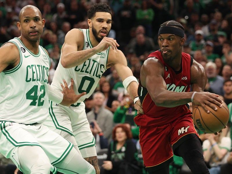 Butler, Lowry lead Heat over Celtics to stay in 1st