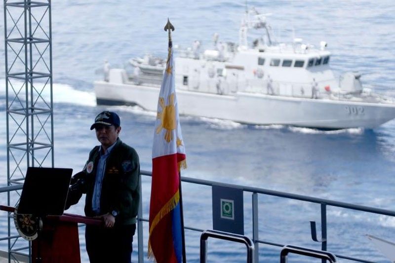 President Marcos views Navy’s demo of new weaponry, but...