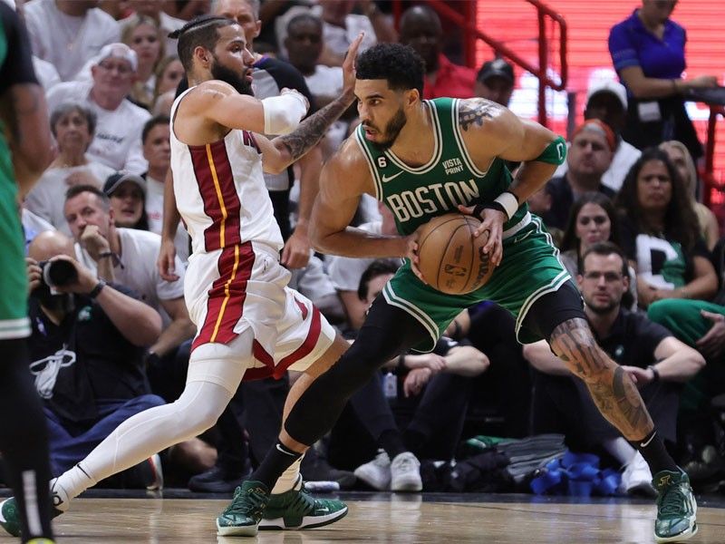 Celtics cool down Heat to stay alive