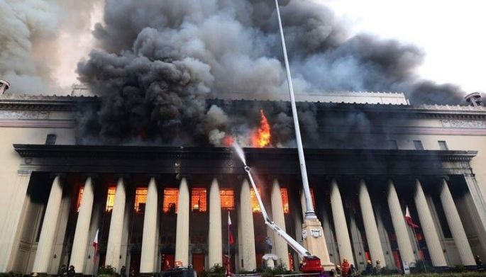 Firefighters respond to a massive fire razing the iconic Manila Central Post Office building in Manila on May 22, 2023. 