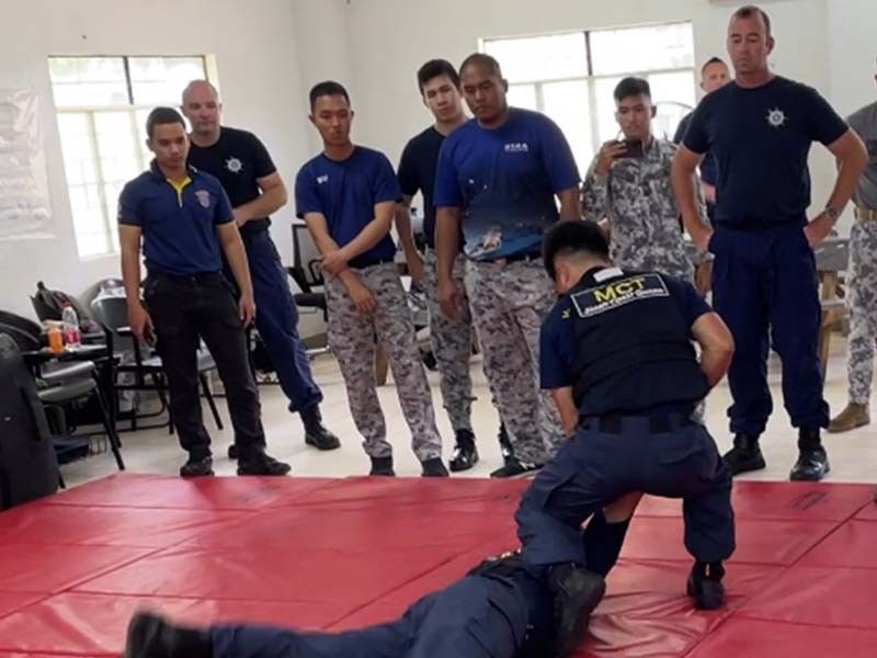 Japan, US coast guards hold training on boarding, arrest techniques