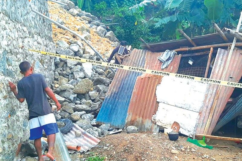 Downpour causes landslides in city