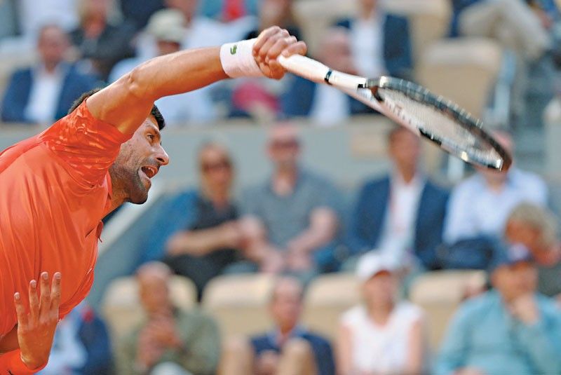 Novak stands firm on clay