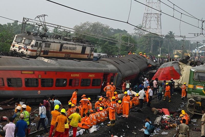 Smashed carriages and corpses: India's train disaster