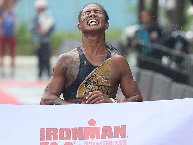 Alcala, Santiago conquer rain-drenched IRONMAN 70.3 race