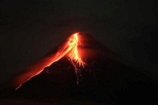 Phivolcs: Lava pouring out of Mayon less violent than explosive eruptions