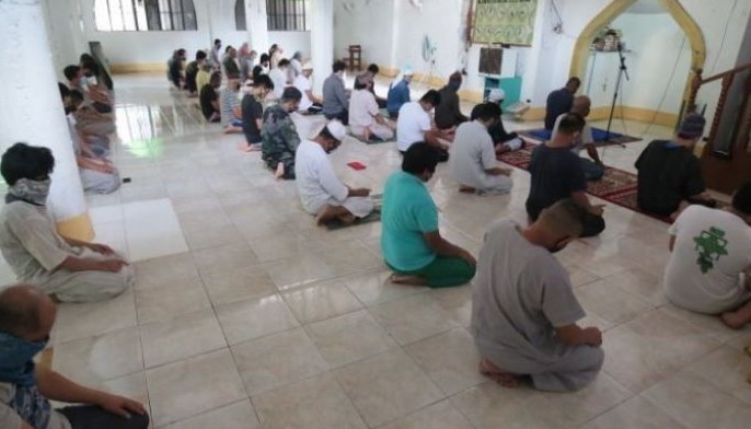 In this July 2020 photo, Muslims practice social distancing at Salam Mosque in Salam Compound during their noon time prayer, a day ahead of Eid al-Adha.