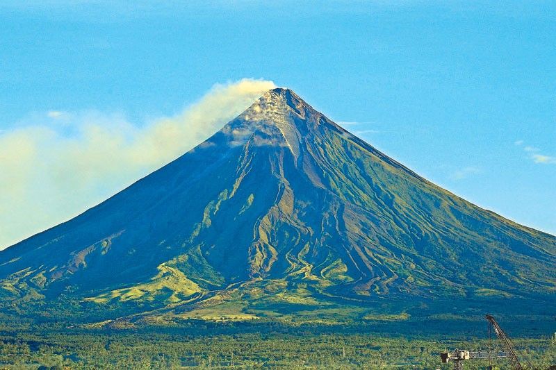 Sustained lava flows, collapsed debris cascade farther down Mayon