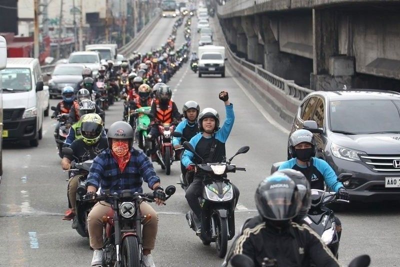 Transport groups urge government to lift motorcycle taxi limits