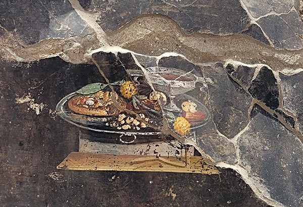 Newly discovered 2,000-year-old Pompeii painting depicts early 'form' of pizza